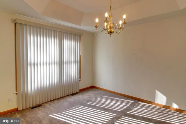 a view of a chandelier in a room