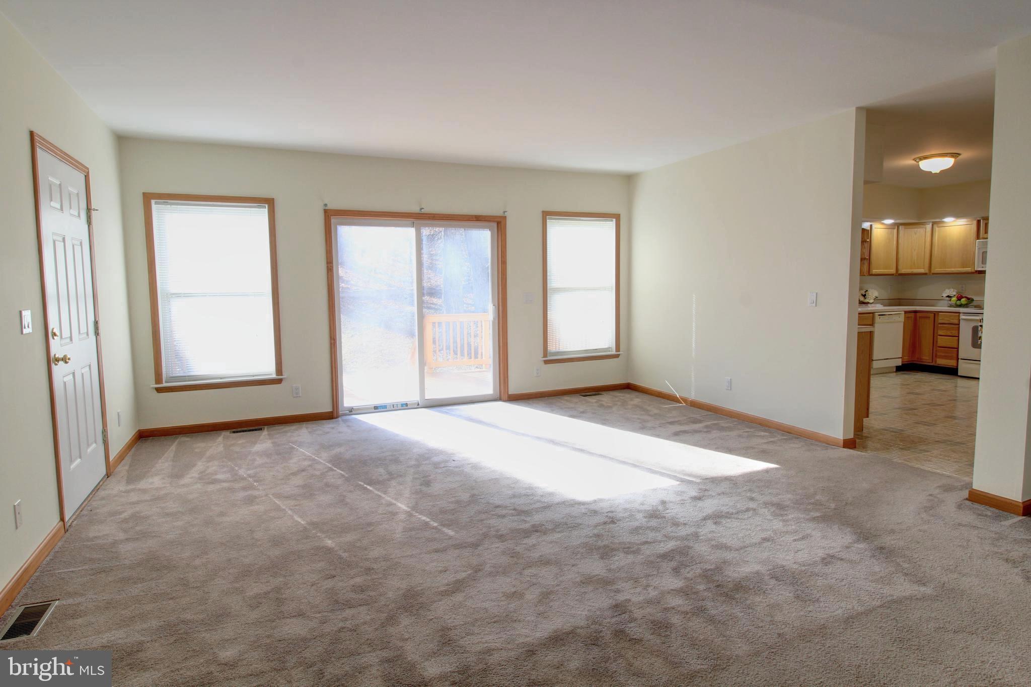 745 Fire Trail Road Front Royal, VA 22630 - Photo 21 of 58 an empty room with windows and entrance