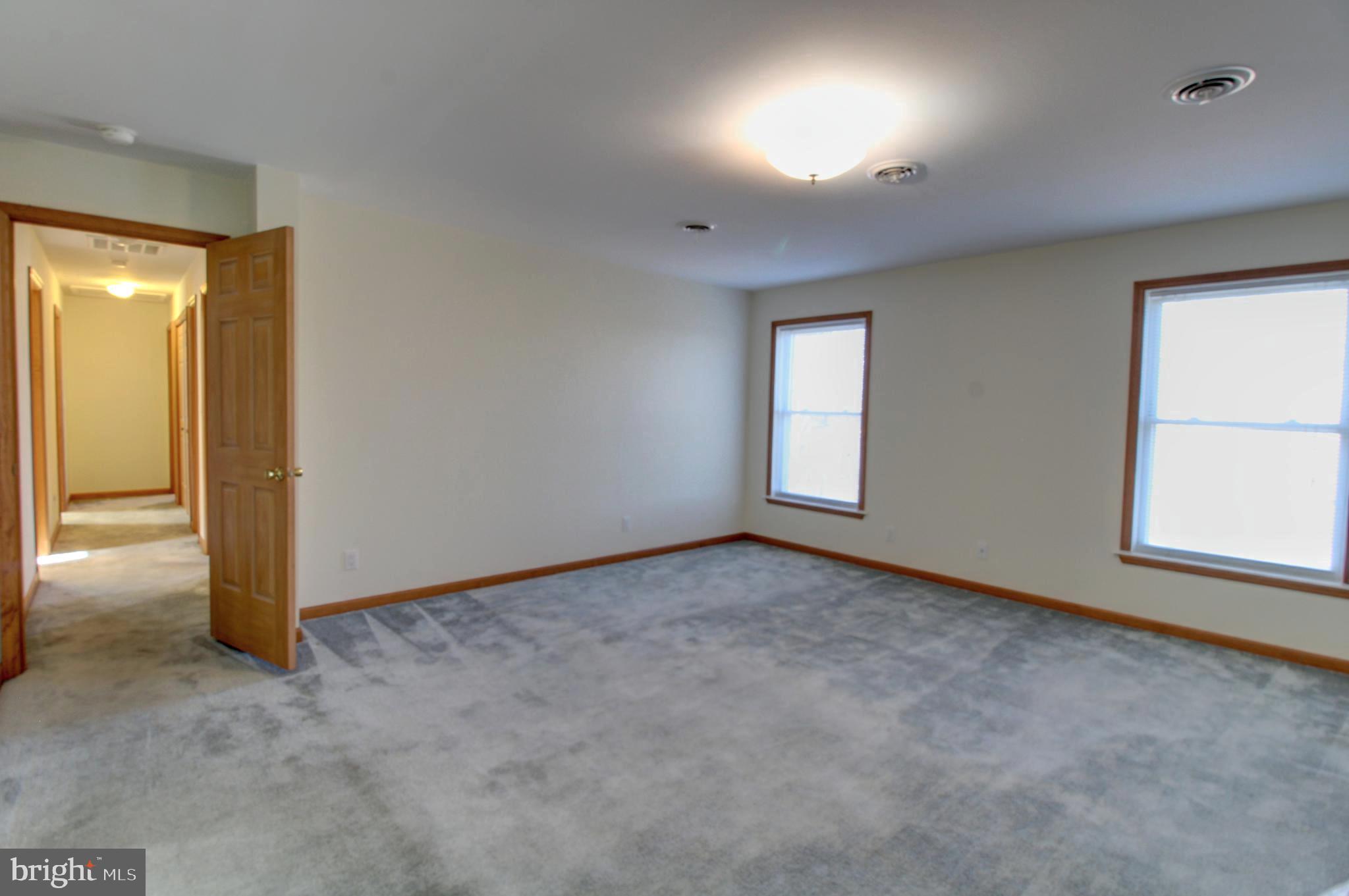 745 Fire Trail Road Front Royal, VA 22630 - Photo 26 of 58 an empty room with windows and closet