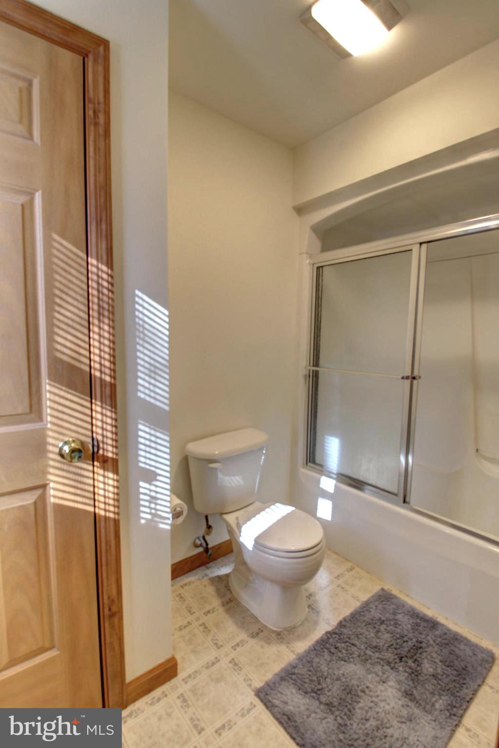 745 Fire Trail Road Front Royal, VA 22630 - Photo 30 of 58 a bathroom with a toilet and a shower