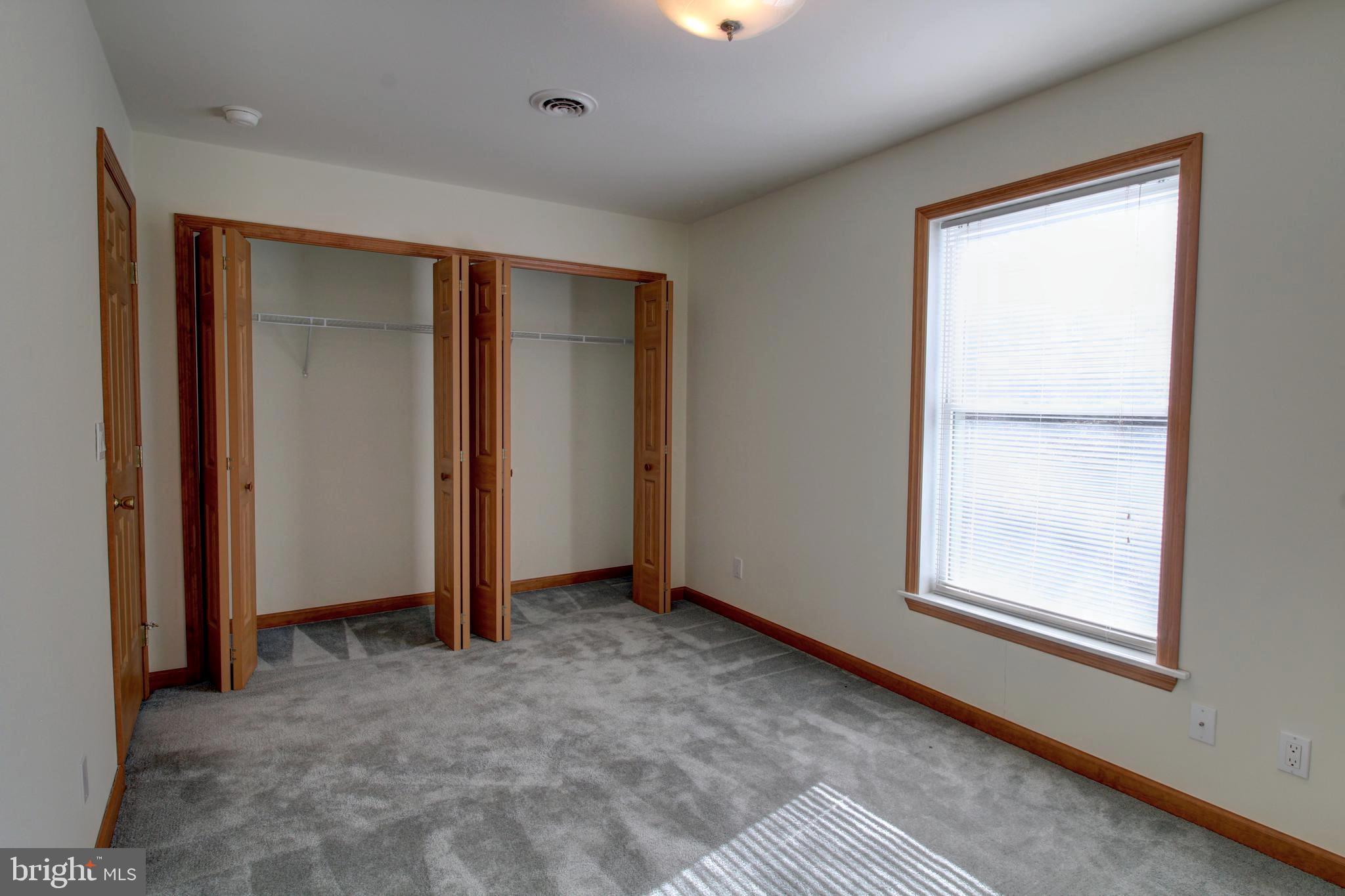 745 Fire Trail Road Front Royal, VA 22630 - Photo 38 of 58 an empty room with windows and closet