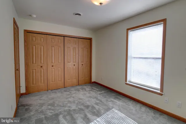 a view of a bathroom from the hallway