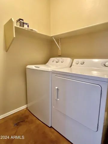 a close view of a sink a mirror and vanity