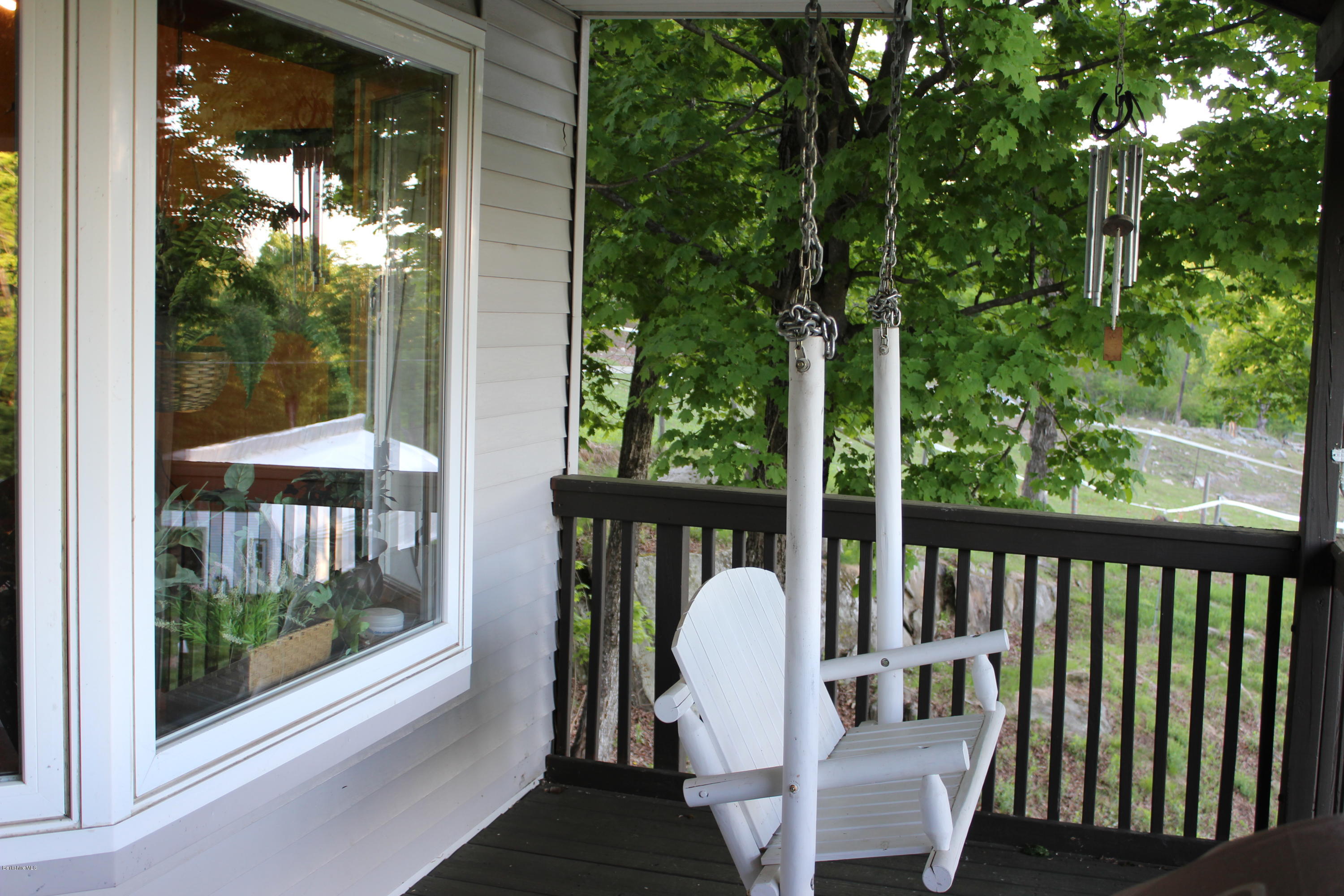 66 Lyon Hill Road Chester, MA 01011 - Photo 23 of 47 porch swing