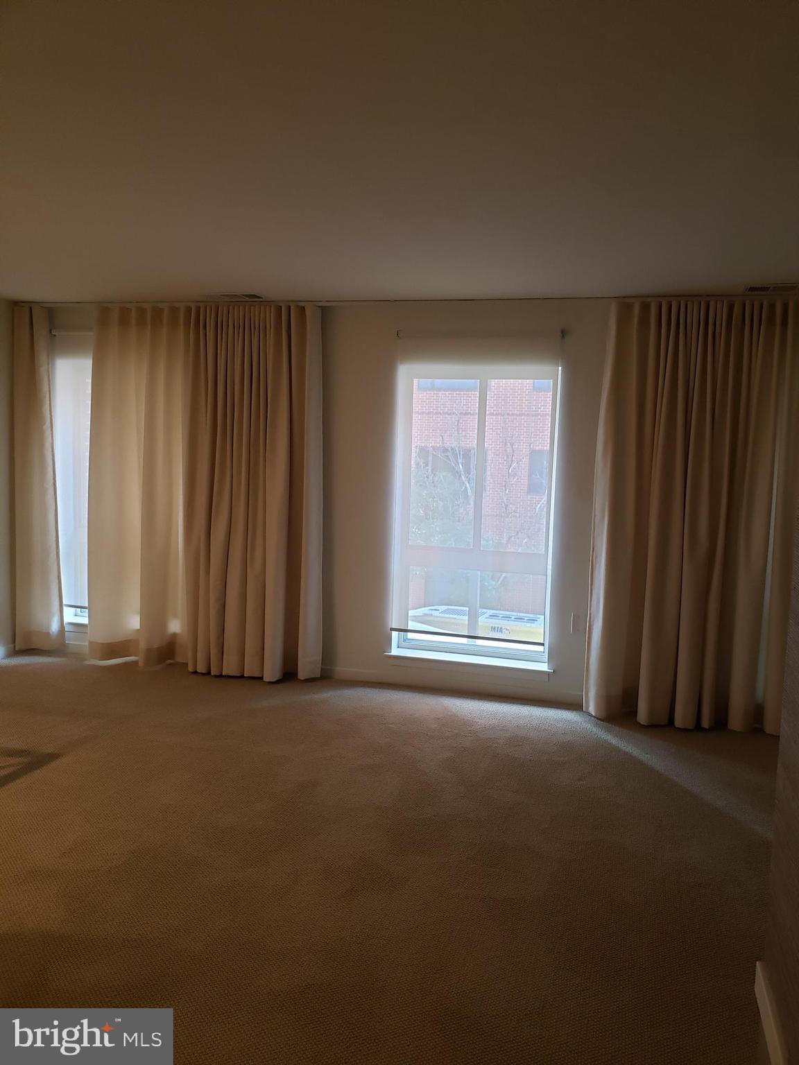 534 South Charles Street, Unit R81 Baltimore, MD 21201 - Photo 14 of 20 Living room- big windows for natural light