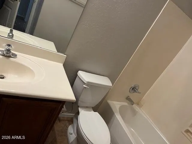 a bathroom with a sink and a toilet