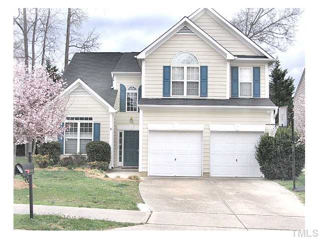 Wow this home has great curb appeal! Interesting roofline, custom windows, level landscaped yard, double garage & driveway welcome you home.Wait til you see the inside!  Fiber cement siding equals long lasting beauty & safety. Back yard is fenced.