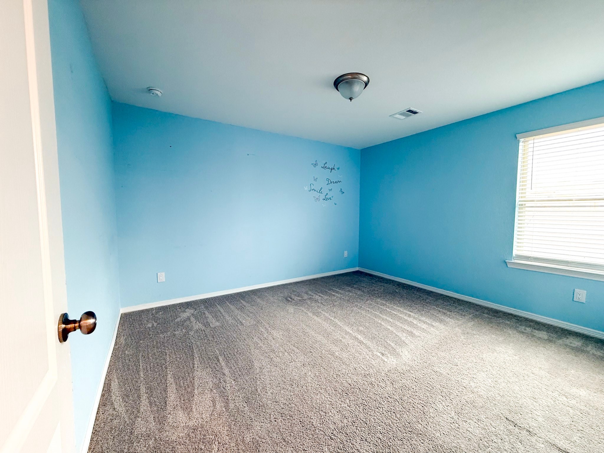 19623 Cat Spruce Court Porter, TX 77365 - Photo 12 of 25 an empty room with windows