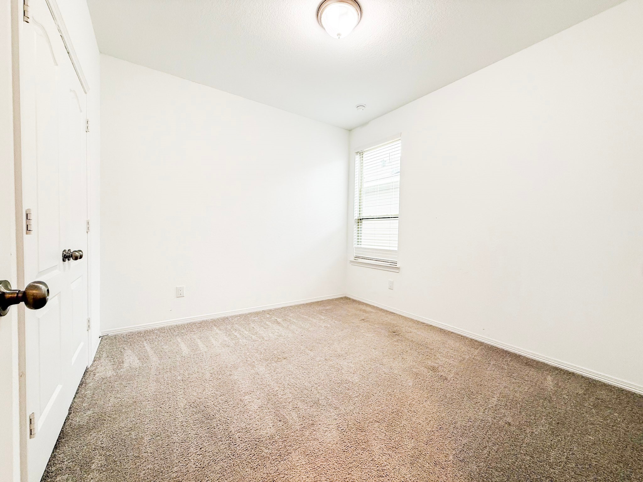 19623 Cat Spruce Court Porter, TX 77365 - Photo 15 of 25 an empty room with windows