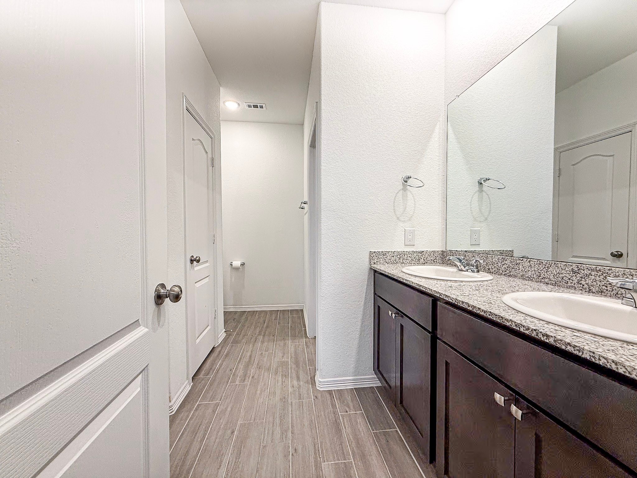 19623 Cat Spruce Court Porter, TX 77365 - Photo 18 of 25 a bathroom with a granite countertop sink toilet and shower