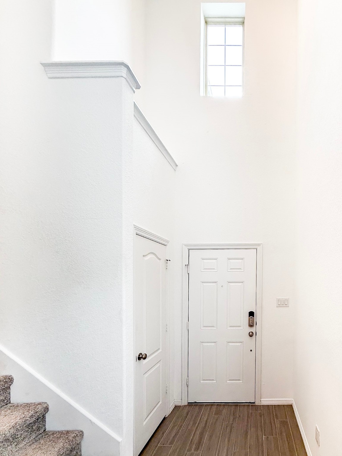 19623 Cat Spruce Court Porter, TX 77365 - Photo 3 of 25 a view of a hallway with wooden floor and closet