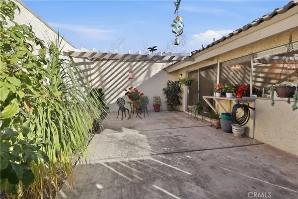 a view of a garage with parked cars
