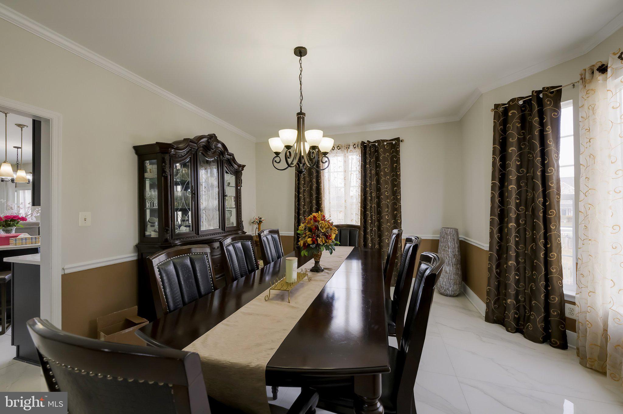 601 Crossover Court Frederick, MD 21703 - Photo 37 of 55 Elegant dining space with rich decor.