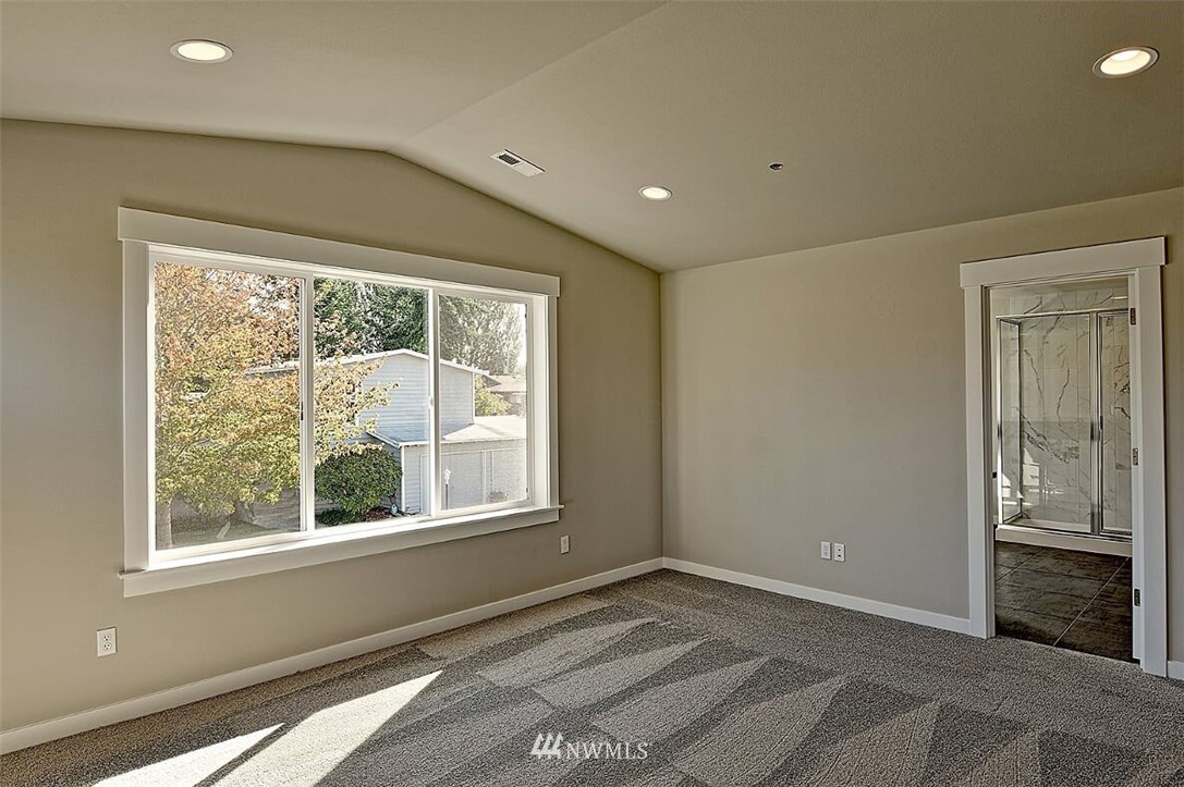 19721 1st Drive Southeast, Unit 8 Bothell, WA 98012 - Photo 15 of 28 a view of an empty room with a window
