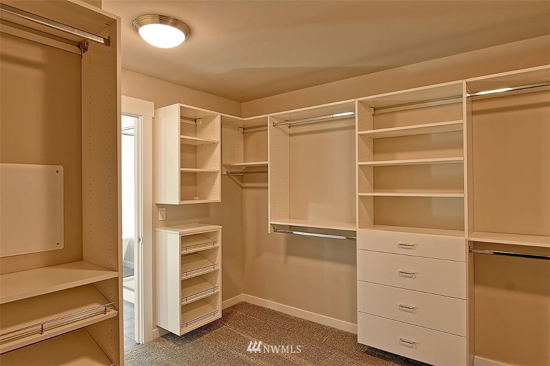19721 1st Drive Southeast, Unit 8 Bothell, WA 98012 - Photo 19 of 28 a view of an empty walk in closet