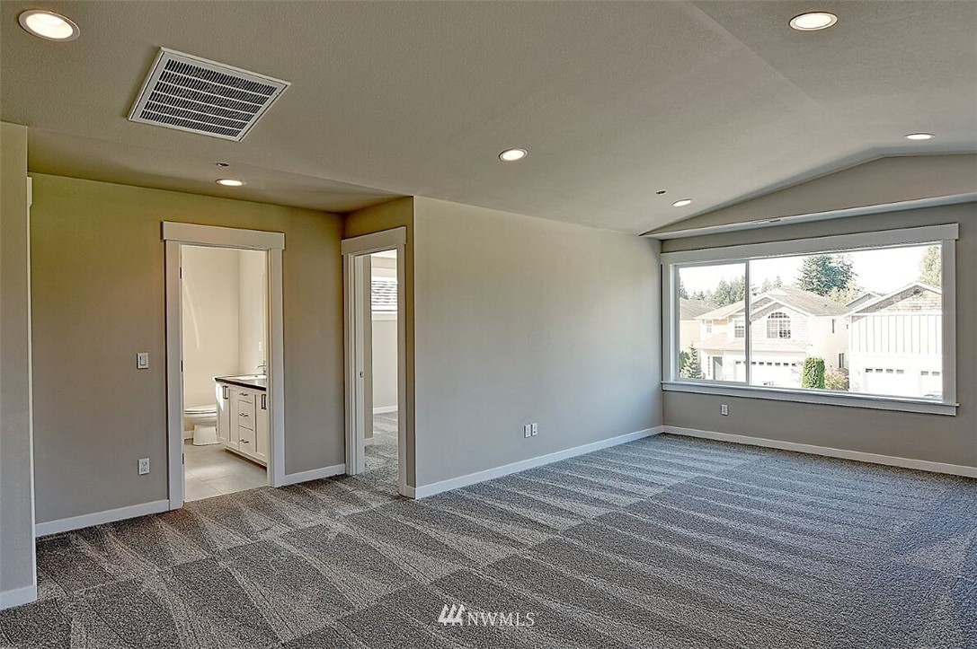 19721 1st Drive Southeast, Unit 8 Bothell, WA 98012 - Photo 20 of 28 a view of an empty room with a window