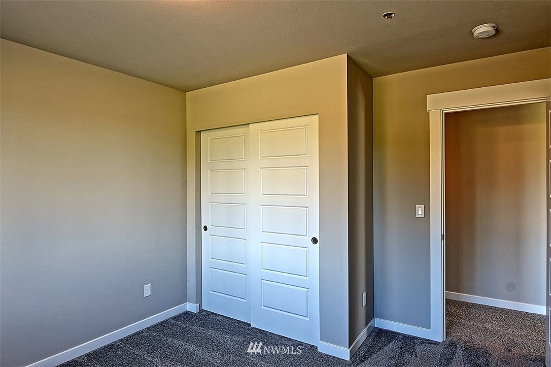 19721 1st Drive Southeast, Unit 8 Bothell, WA 98012 - Photo 24 of 28 a view of an empty room