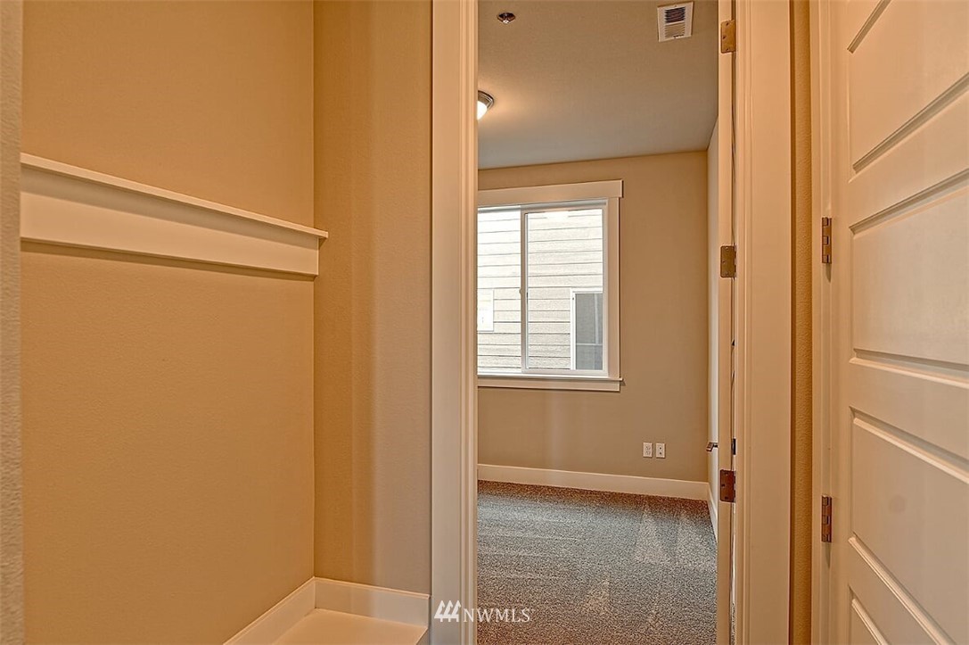 19721 1st Drive Southeast, Unit 8 Bothell, WA 98012 - Photo 4 of 28 a view of an empty room