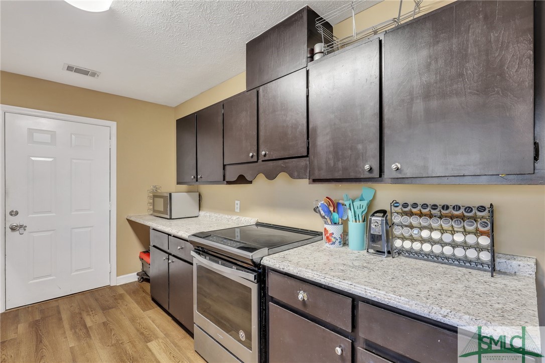 348 Blandford Road Rincon, GA 31326 - Photo 12 of 25 Kitchen - door to side patio