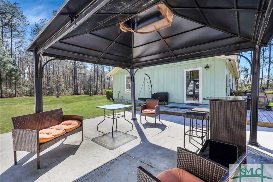348 Blandford Road Rincon, GA 31326 - Photo 4 of 25 Side door Patio