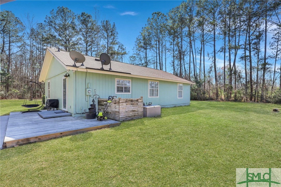 348 Blandford Road Rincon, GA 31326 - Photo 5 of 25 Side deck from Rear of home