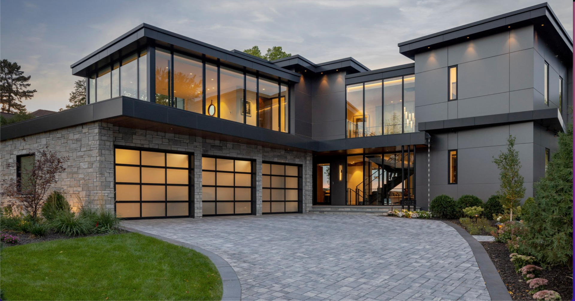 2813 Regner Road McHenry, IL 60051 - Photo 5 of 5 a front view of a house with a yard and garage
