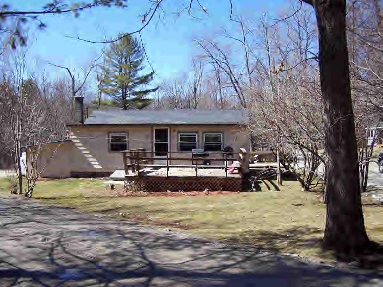 38 Elm Road Richmond, MA 01201 - Photo 1 of 1 a view of a house with backyard and sitting area