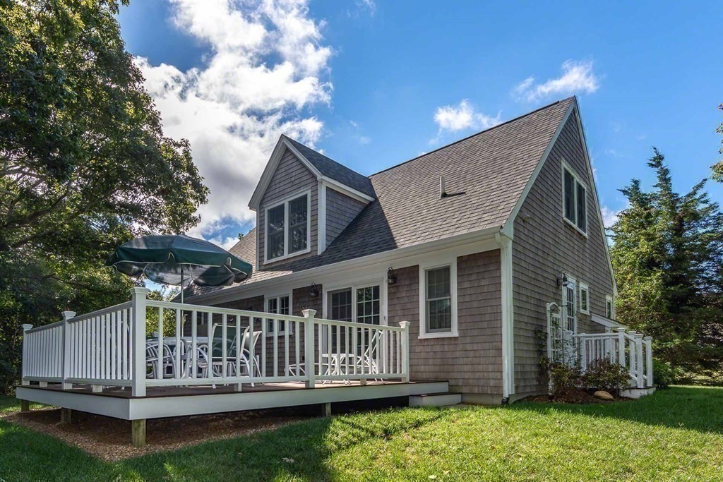196 Springhill Road Tisbury, MA 02568 - Photo 31 of 32 a view of deck with a garden