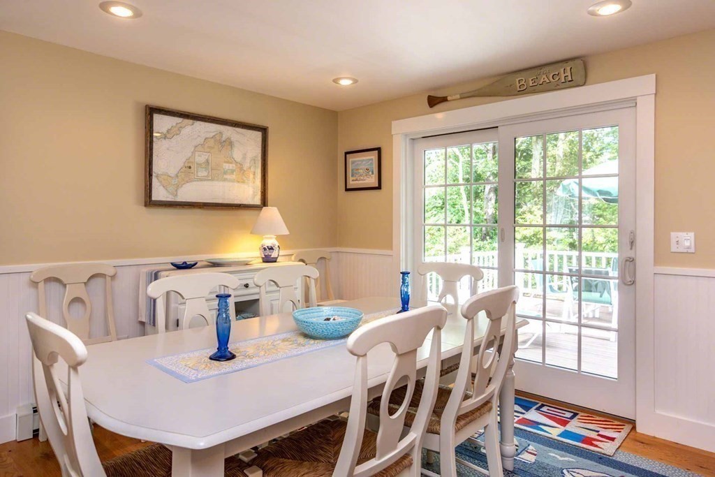 196 Springhill Road Tisbury, MA 02568 - Photo 9 of 32 a view of a dining room with furniture window and outside view