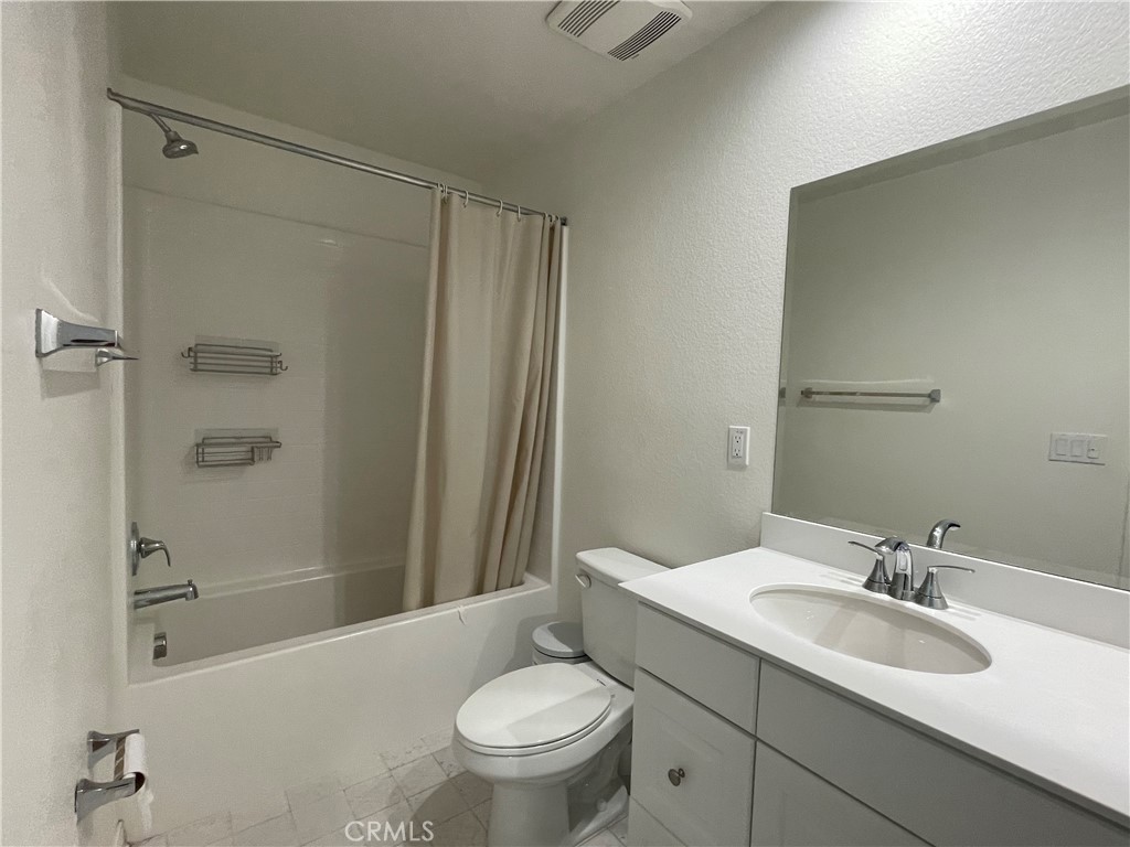 20107 Curaco Court Riverside, CA 92507 - Photo 19 of 24 a bathroom with a sink toilet and shower