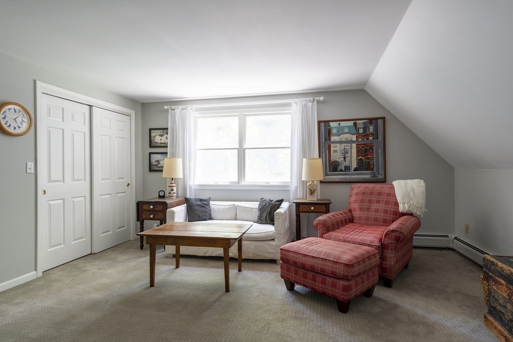 21 Mill Road Ipswich, MA 01938 - Photo 19 of 23 a living room with furniture and a window