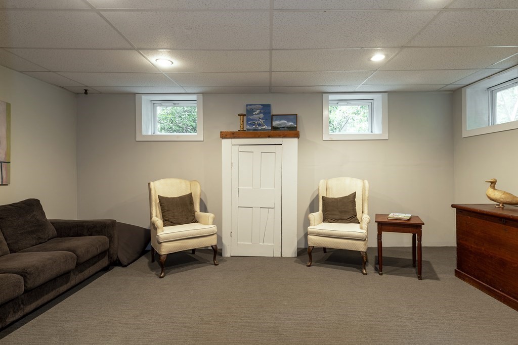 21 Mill Road Ipswich, MA 01938 - Photo 20 of 23 a living room with furniture and a couch
