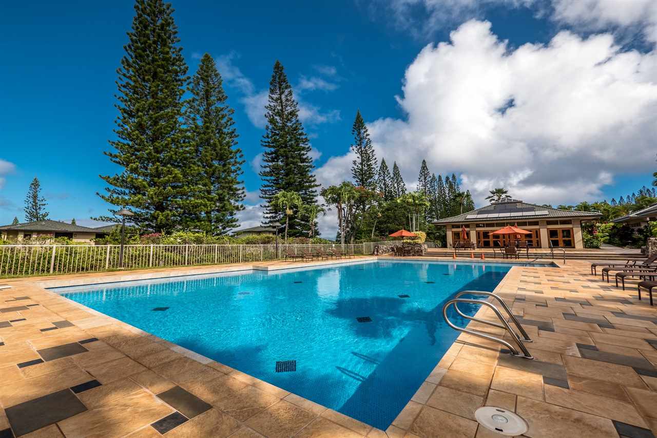 230 Crestview Road, Unit 15 Lahaina, HI 96761 - Photo 13 of 18 a view of swimming pool with seating area and trees in the background