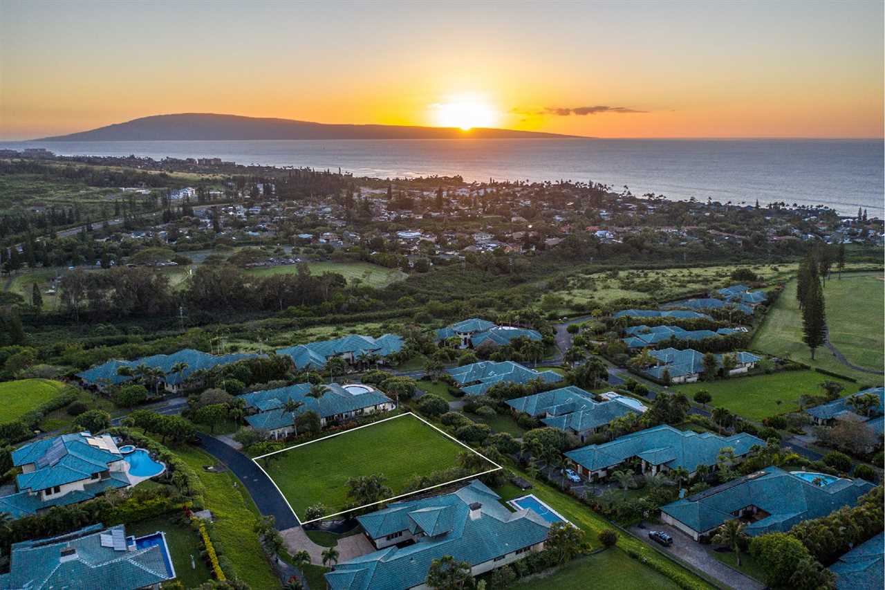 230 Crestview Road, Unit 15 Lahaina, HI 96761 - Photo 3 of 18 an aerial view of a city with lots of residential buildings and mountain view in back