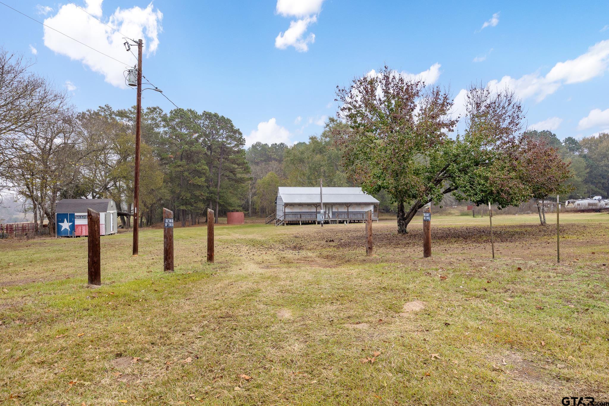 11063 County Road 2298 Tyler, TX 75707 - Photo 2 of 21 a house view with swimming pool