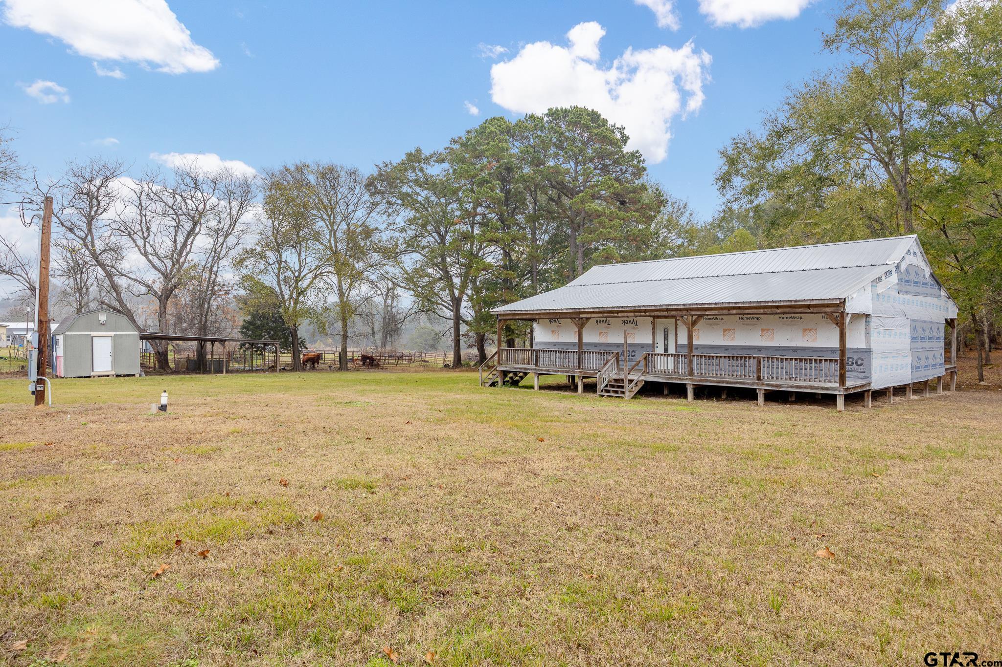 11063 County Road 2298 Tyler, TX 75707 - Photo 5 of 21 a front view of house with yard and trees