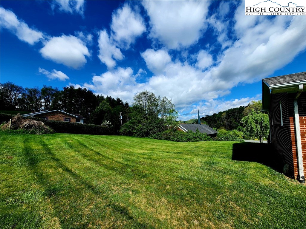 130 Wheeler Street Boone, NC 28607 - Photo 11 of 40 a view of yard with grass & fence