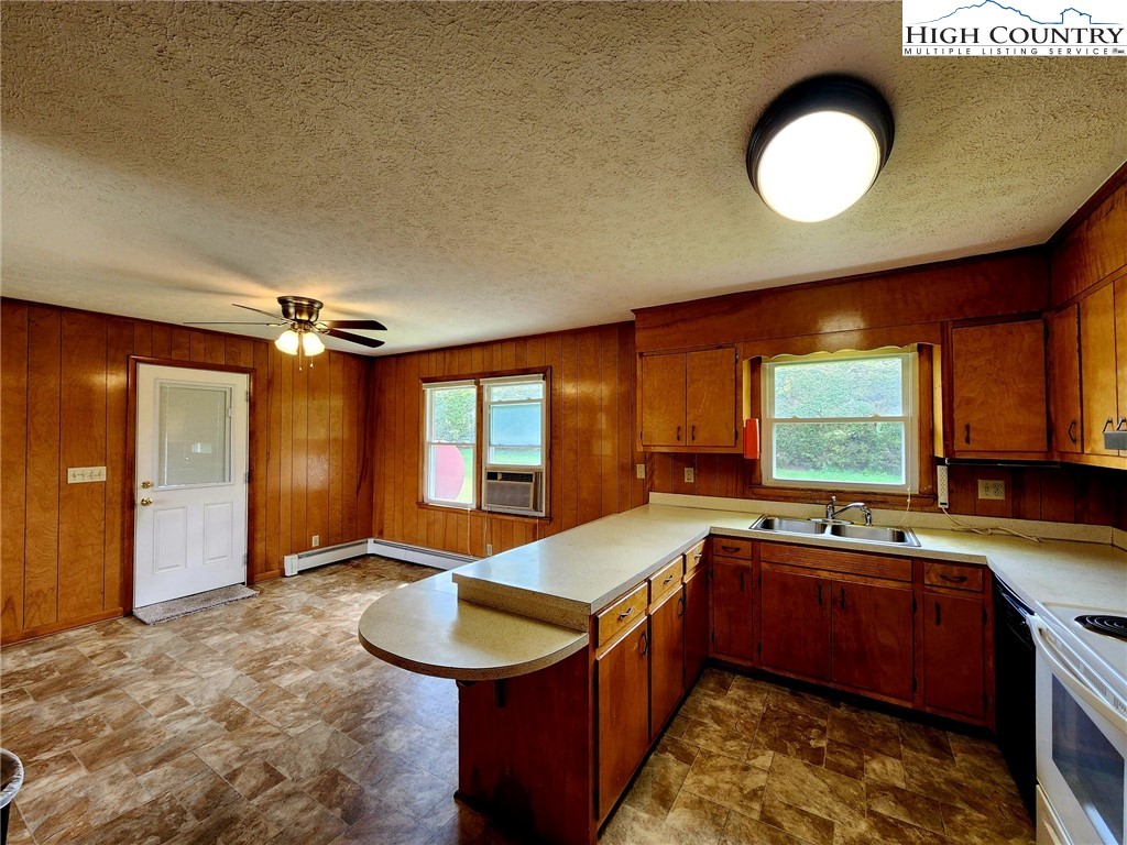 130 Wheeler Street Boone, NC 28607 - Photo 21 of 40 a kitchen with large windows and sink