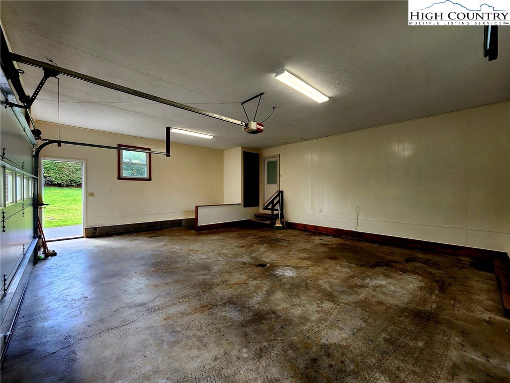 130 Wheeler Street Boone, NC 28607 - Photo 38 of 40 a view of a room with wooden floor and windows