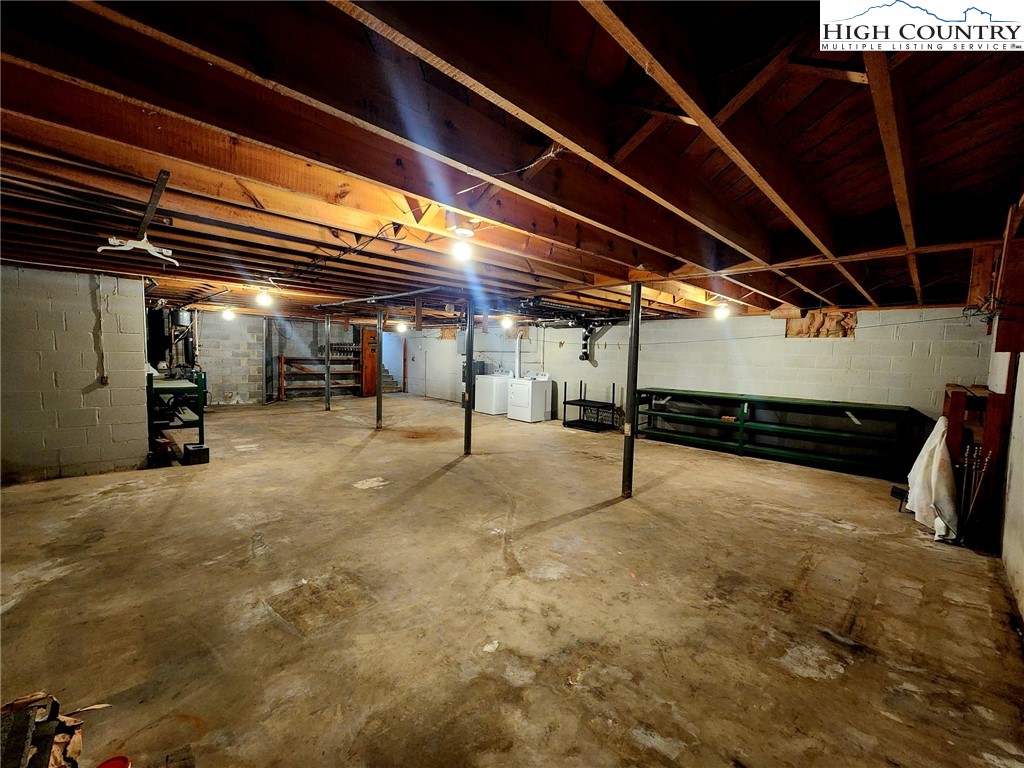 130 Wheeler Street Boone, NC 28607 - Photo 40 of 40 a view of empty room with wooden ceiling