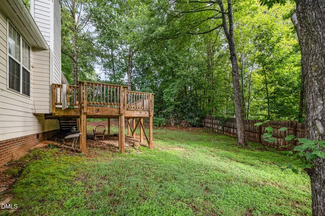 a view of balcony with deck and wooden floor