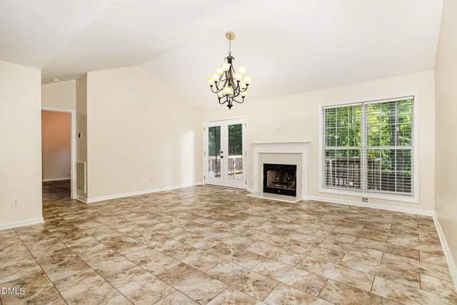 a view of a room with a fireplace