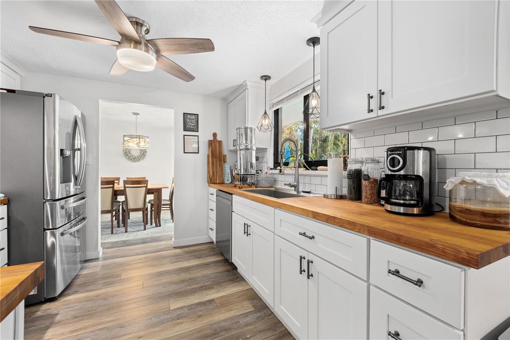 1481 Piedmont Road Venice, FL 34293 - Photo 14 of 52 Kitchen is connected to formal living space and family room