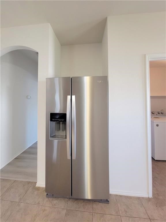 120 Inca Dove Lane Leander, TX 78641 - Photo 7 of 15 a metallic refrigerator freezer sitting in a kitchen