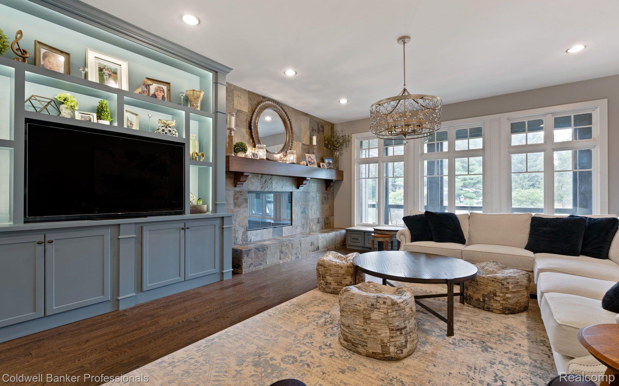 5131 West Road Washington, MI 48094 - Photo 8 of 111 custom built bookcase with LED back lighting