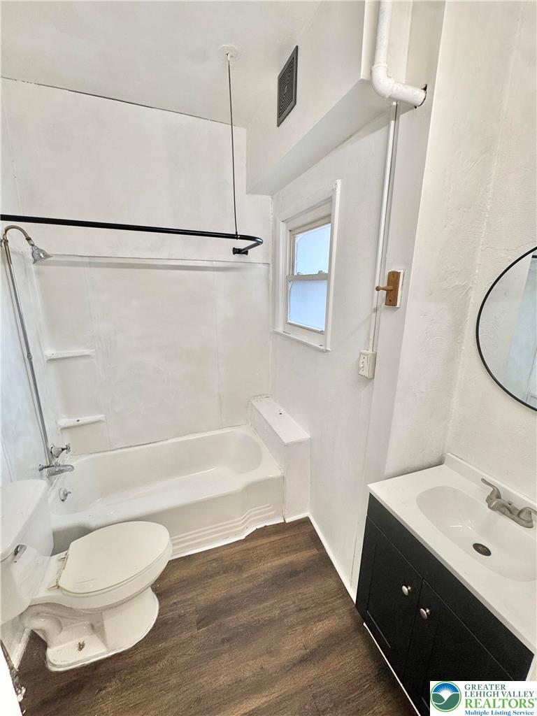 540 Montclair Avenue, Unit 1 Bethlehem, PA 18015 - Photo 7 of 9 a bathroom with a sink a toilet and shower
