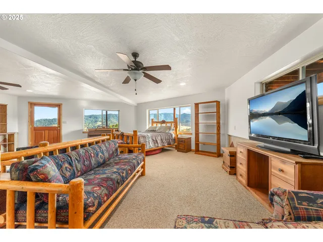 a bathroom with a sink a shower and a mirror