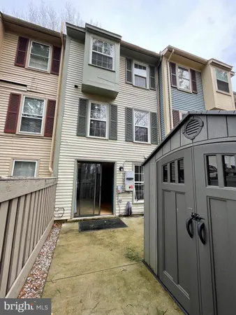 a view of a house with a large window