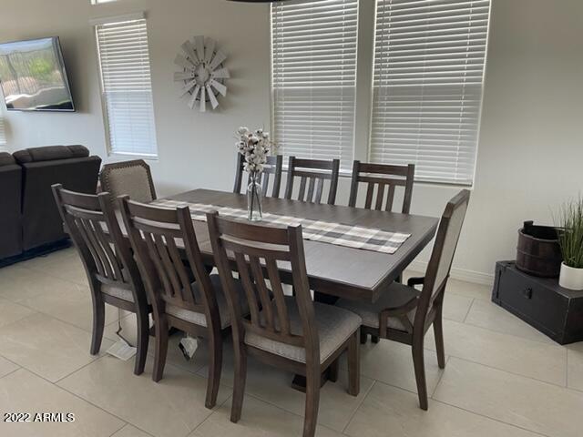 38500 North School House Road, Unit 50 Cave Creek, AZ 85331 - Photo 5 of 17 a view of a dining room with furniture