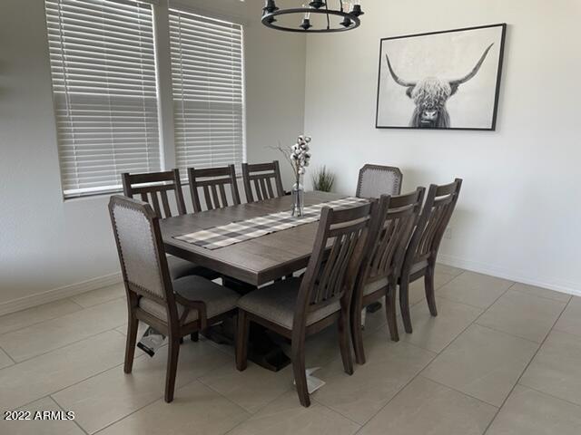 38500 North School House Road, Unit 50 Cave Creek, AZ 85331 - Photo 6 of 17 a view of a dining room with furniture